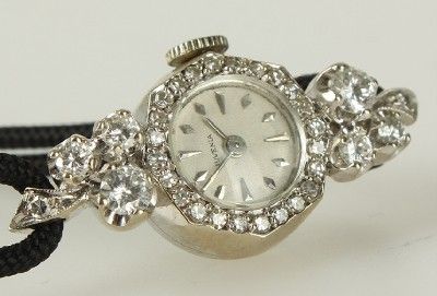 Juvenia 14k Gold Ladies Swiss Made Watch Incrustated with Diamonds