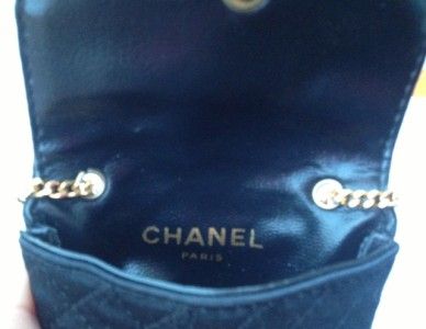 vailable to you is a Chanel Satin CC Mini Pouch Bag. This bag is