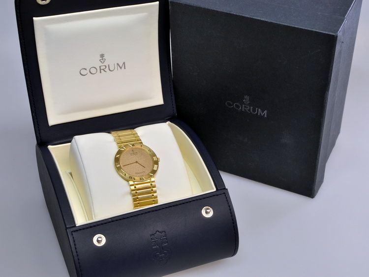 CORUM ROMULUS VOLLGOLD / 18kt GELBGOLD  50.503.56 V048